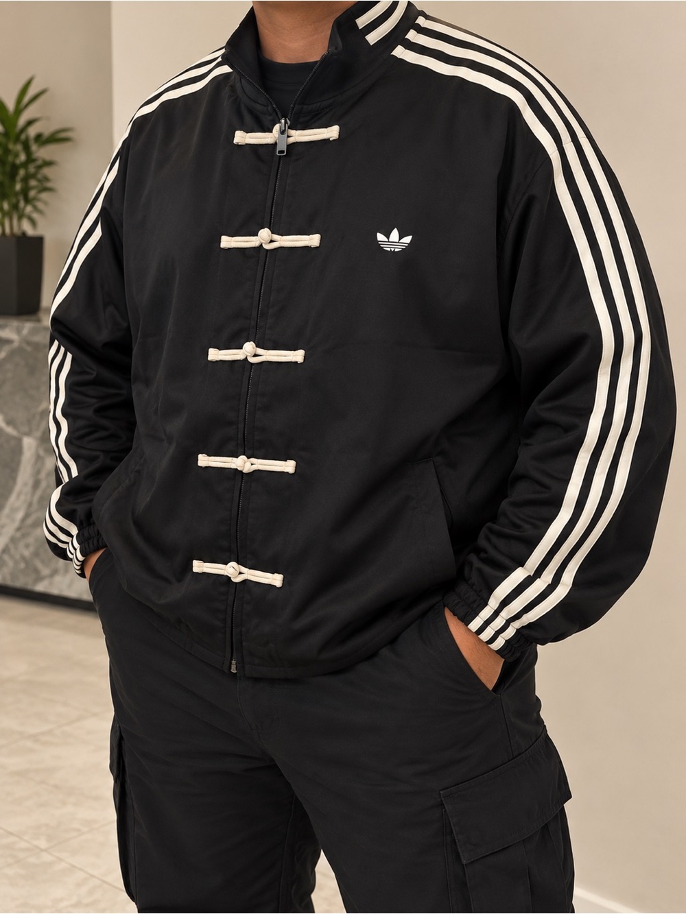 adidas Originals Black Jacket with White Stripe Accents